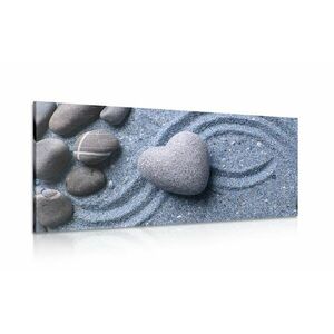 Obraz serce z kamienia na piaszczystym tle obraz