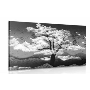 Obraz czarno-białe drzewo pokryte chmurami obraz