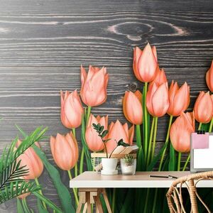 Samoprzylepna fototapeta pomarańczowe tulipany na drewnianym tle obraz