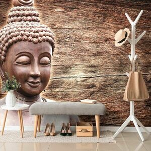 Samoprzylepna tapeta Posąg Buddy na drewnianym tle obraz
