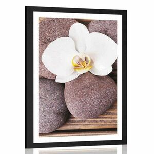 Plakat z passe-partout kamienie wellness i orchidea na drewnianym tle obraz