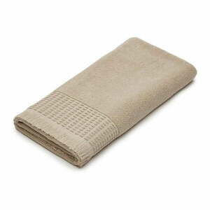 Beżowy bawełniany ręcznik 70x140 cm Veta – Kave Home obraz