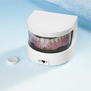Urządzenie do czyszczenia protez zębow. obraz